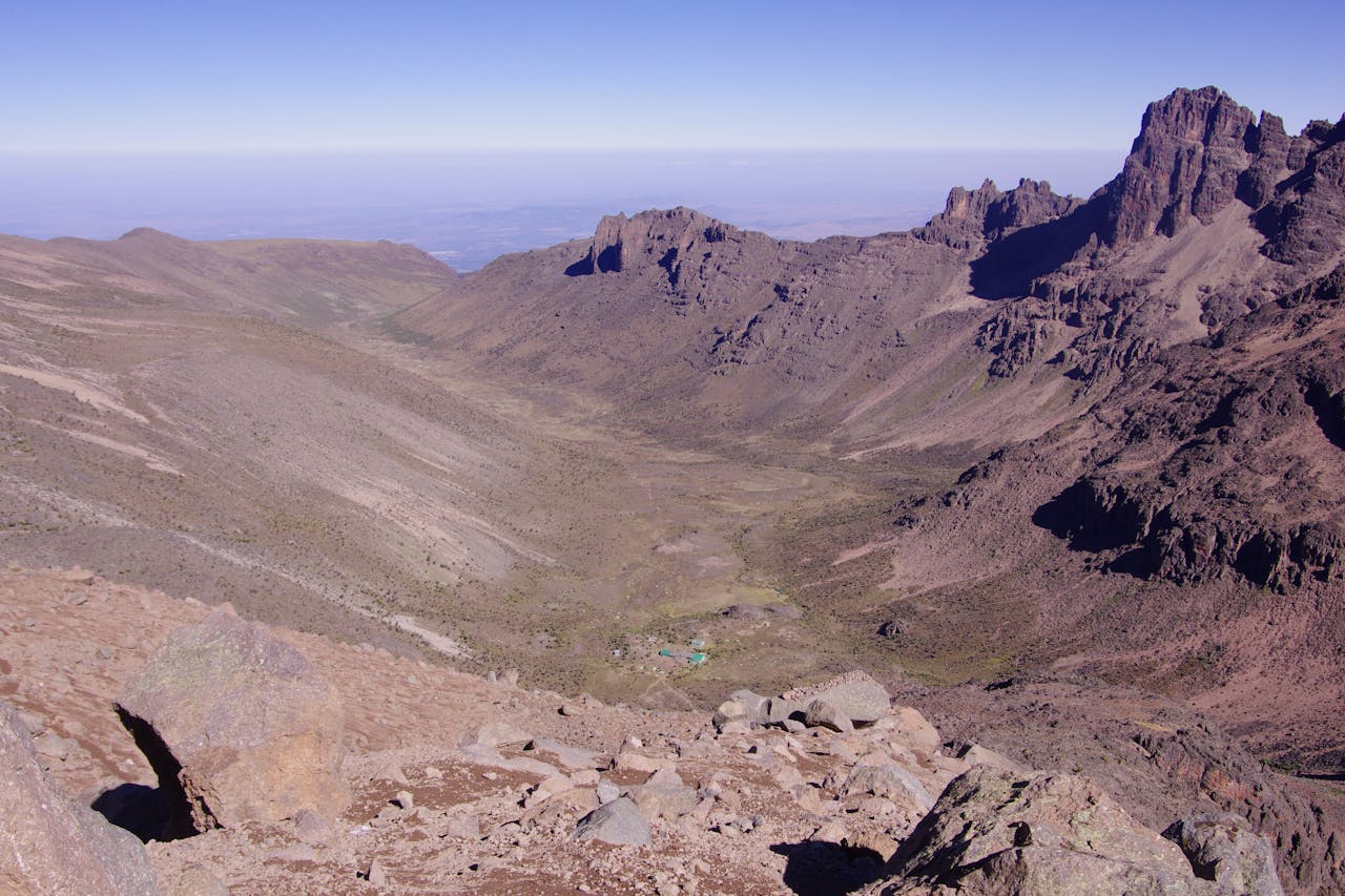 Stunning aerial view of Mount Kenya's rocky and expansive landscape in Kirinyaga County.